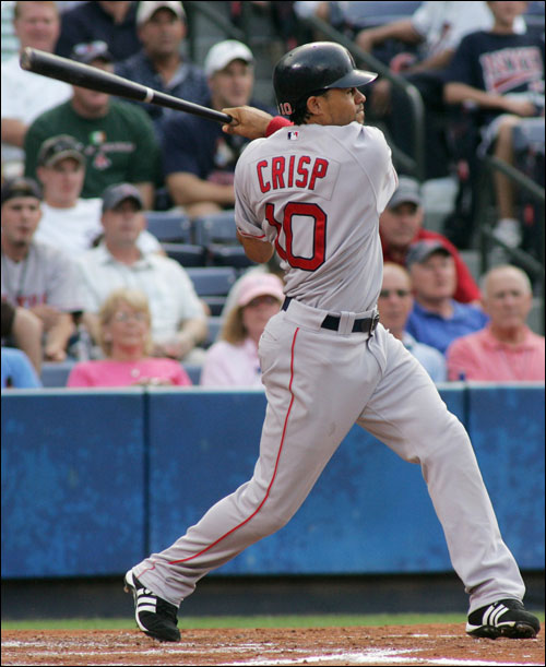 Coco Crisp connects on a solo home run off Atlanta Braves starting pitcher Chuck James in the second inning.