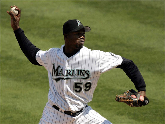 Guillermo Mota, No. 59 of the Fliorida Marlins, closes out the Atlanta Braves in the ninth inning at Dolphins Stadium on April 5, 2005 in Miami, Fla.