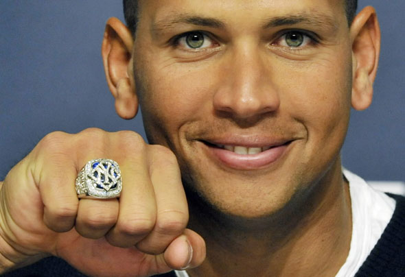 Alex Rodriguez shows his 2009 World Series Championship ring at a news conference following the Yankees 7-5 win over the Los Angeles Angels of Anaheim in their MLB American League baseball game at Yankee Stadium in New York, April 13, 2010. 