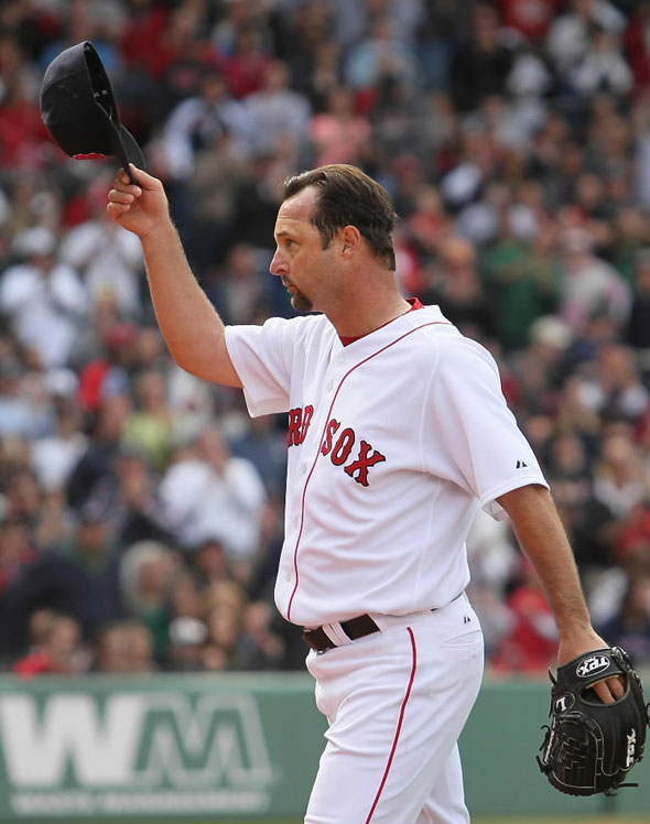 Tim Wakefield of the Red Sox tips his cap tot he crowd during the game against the Baltimore Orioles at Fenway Park on April 25, 2010 in Boston, Massachusetts.