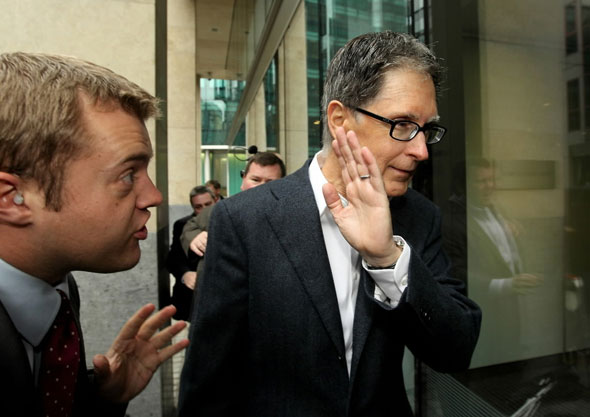 Oct. 15: John W. Henry (R), the owner of New England Sports Ventures, arrives at the offices of the law firm Slaughter and May on October 15, 2010 in London, England. 
