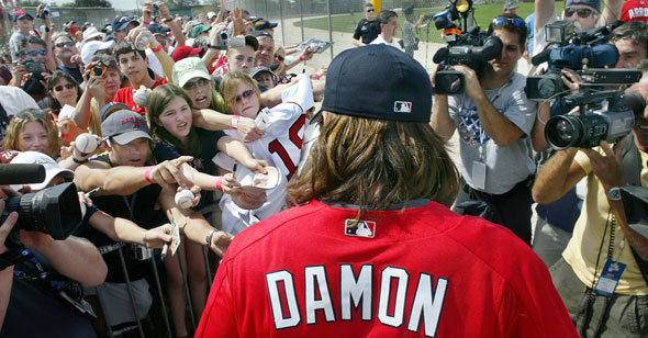 The scene this afternoon at the Red Sox minor league facility looked more like a rock concert than a sporting venue, and at no time did it more so than when Red Sox centerfielder Johnny Damon came out of the clubhouse and made his way to the field.