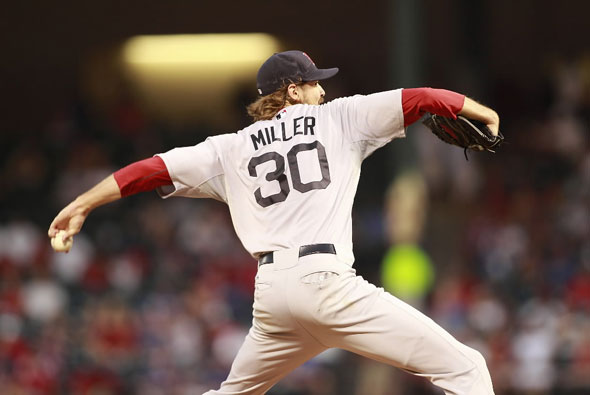 Miller throws a pitch against the Texas Rangers during the game at Rangers Ballpark in Arlington on August 25, 2011 in Arlington, Texas.