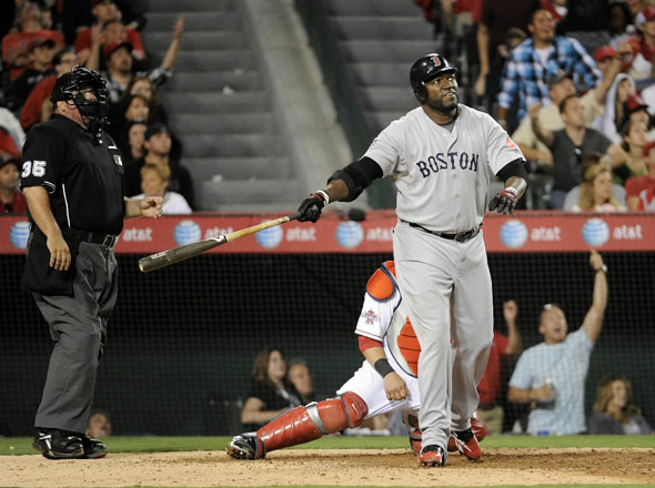 David Ortiz of the Boston Red Sox watches his two run homerun for a 4-1 lead over the Los Angeles Angels during the eighth inning at Angel Stadium on July 26, 2010 in Anaheim, California.