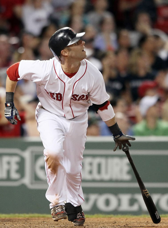Pedroia gets a hit against the Kansas City Royals on July 26, 2011 at Fenway Park in Boston, Massachusetts