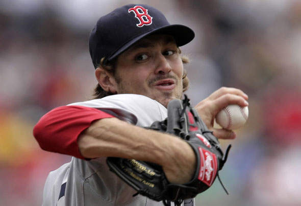 Red Sox pitcher Andrew Miller throws during the first inning of an interleague baseball game against the Pittsburgh Pirates in Pittsburgh, Sunday, June 26, 2011.