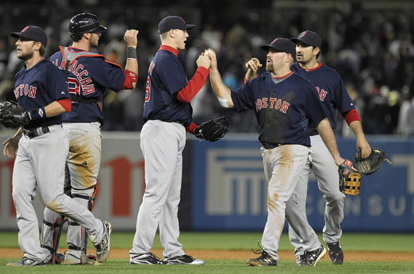 Jonathan Papelbon and Kevin Youkilis of the Boston Red Sox celebrate a 5-4 win against the New York Yankees on May 13, 2011 at Yankee Stadium in the Bronx borough of New York City.