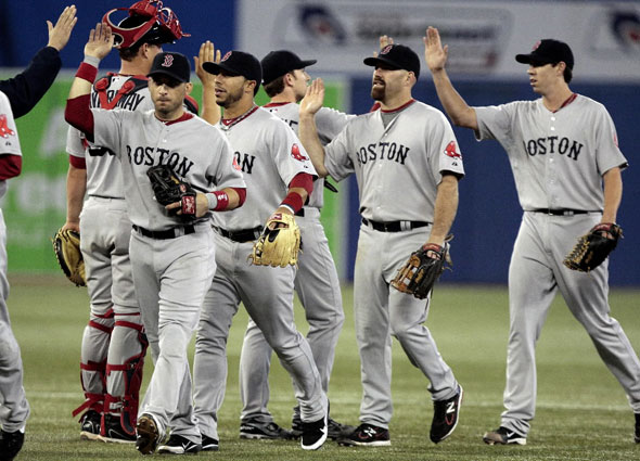 SEPTEMBER 6: Boston Red Sox celebrate the win against the Toronto Blue Jays during MLB action at the Rogers Centre September 6, 2011 in Toronto, Ontario, Canada